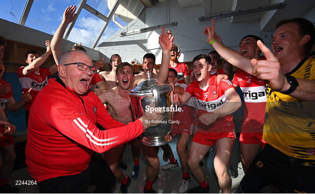 29 May 2022; Derry kitman Colin McGuigan and Derry players celebrate with the trophy after the Ulster GAA Football Senior Championship Final between Derry and Donegal at St Tiernach's Park in Clones, Monaghan. Photo by Ramsey Cardy/Sportsfile