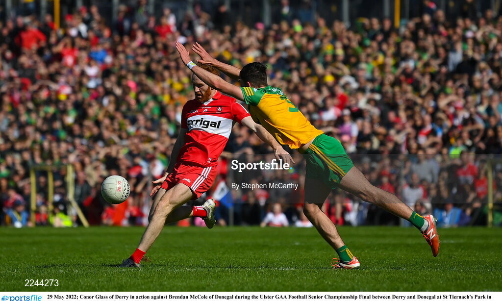 29 May 2022; Conor Glass of Derry in action against Brendan McCole of Donegal during the Ulster GAA Football Senior Championship Final between Derry and Donegal at St Tiernach's Park in Clones, Monaghan. Photo by Stephen McCarthy/Sportsfile