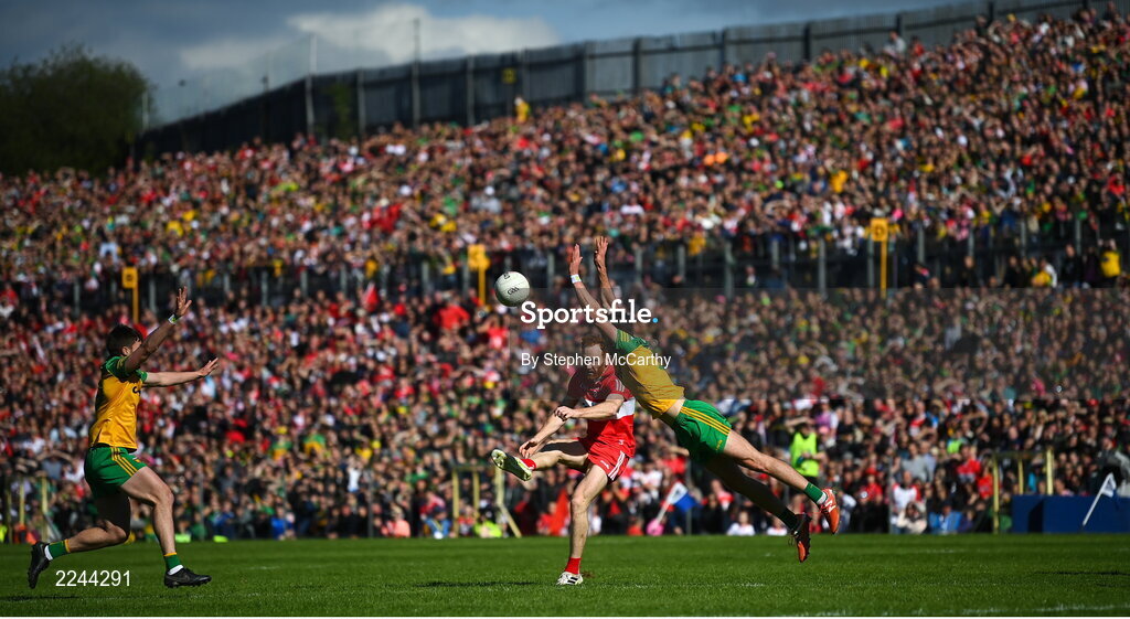29 May 2022; Conor Glass of Derry in action against Brendan McCole of Donegal during the Ulster GAA Football Senior Championship Final between Derry and Donegal at St Tiernach's Park in Clones, Monaghan. Photo by Stephen McCarthy/Sportsfile