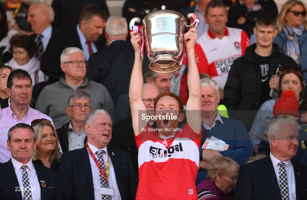 29 May 2022; Conor Glass of Derry lifts the Anglo Celt Cup after the Ulster GAA Football Senior Championship Final between Derry and Donegal at St Tiernach's Park in Clones, Monaghan. Photo by Stephen McCarthy/Sportsfile