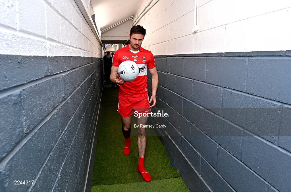 29 May 2022; Derry captain Christopher McKaigue returns to the dressing room with the match ball after the Ulster GAA Football Senior Championship Final between Derry and Donegal at St Tiernach's Park in Clones, Monaghan. Photo by Ramsey Cardy/Sportsfile