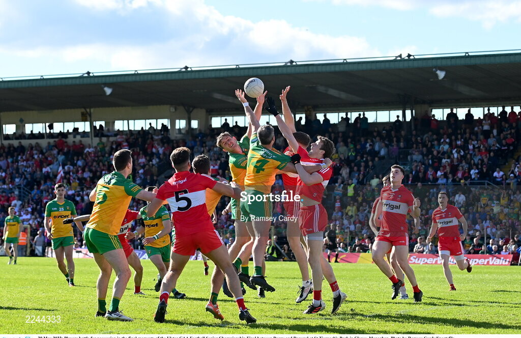 29 May 2022; Players battle for possession in the final moments of the Ulster GAA Football Senior Championship Final between Derry and Donegal at St Tiernach's Park in Clones, Monaghan. Photo by Ramsey Cardy/Sportsfile