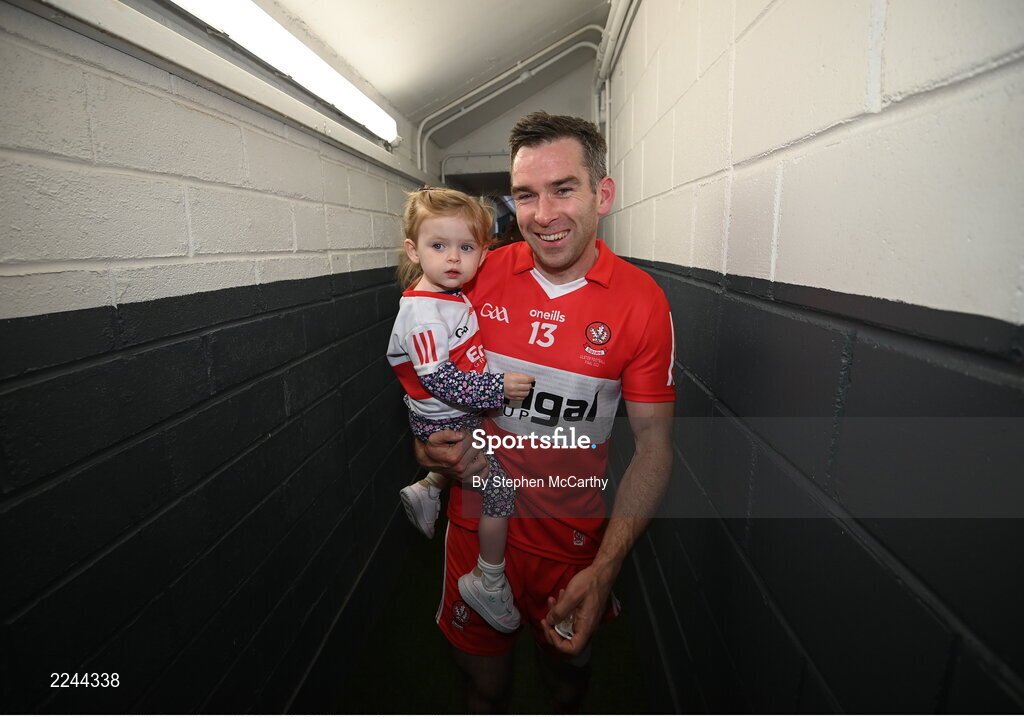 29 May 2022; Benny Heron of Derry and his daughter May Grace after the Ulster GAA Football Senior Championship Final between Derry and Donegal at St Tiernach's Park in Clones, Monaghan. Photo by Stephen McCarthy/Sportsfile