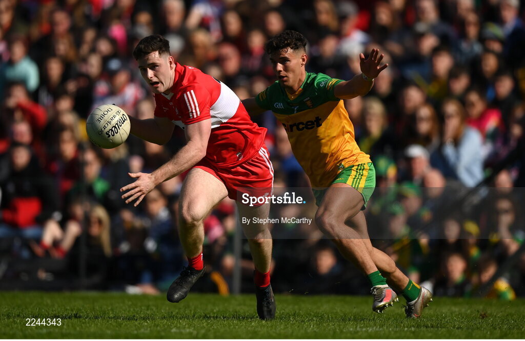 29 May 2022; Padraig McGrogan of Derry in action against Odhran McFadden Ferry of Donegal during the Ulster GAA Football Senior Championship Final between Derry and Donegal at St Tiernach's Park in Clones, Monaghan. Photo by Stephen McCarthy/Sportsfile