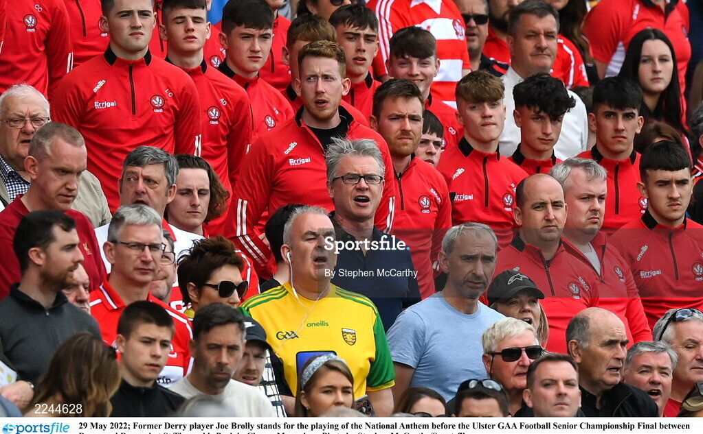 29 May 2022; Former Derry player Joe Brolly stands for the playing of the National Anthem before the Ulster GAA Football Senior Championship Final between Derry and Donegal at St Tiernach's Park in Clones, Monaghan. Photo by Stephen McCarthy/Sportsfile