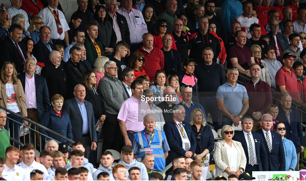 29 May 2022; Spectators in the ard chomhairle section including Ulster GAA president Ciaran McLaughlin and Ulster GAA vice-president Michael Geoghegan stand for the playing of the National Anthem before the Ulster GAA Football Senior Championship Final between Derry and Donegal at St Tiernach's Park in Clones, Monaghan. Photo by Stephen McCarthy/Sportsfile