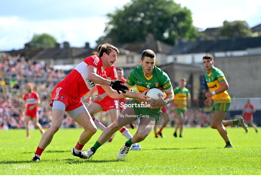 29 May 2022; Eoghan Ban Gallagher of Donegal in action against Brendan Rogers of Derry during the Ulster GAA Football Senior Championship Final between Derry and Donegal at St Tiernach's Park in Clones, Monaghan. Photo by Ramsey Cardy/Sportsfile