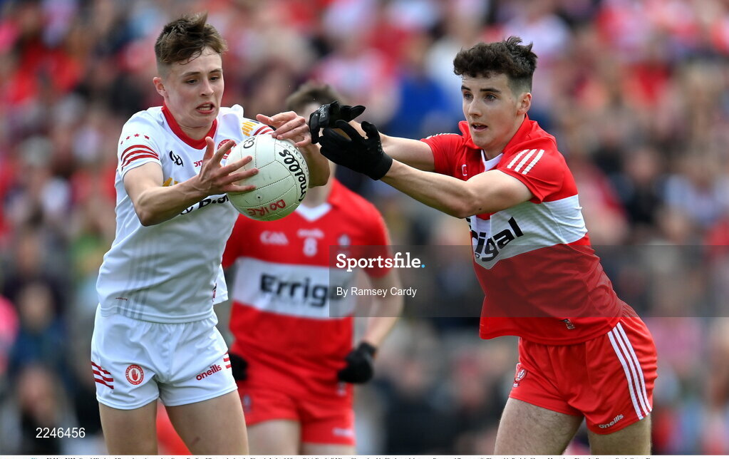29 May 2022; Conal Higgins of Derry in action against Conan Devlin of Tyrone during the Electric Ireland Ulster GAA Football Minor Championship Final match between Derry and Tyrone at St Tiernach's Park in Clones, Monaghan. Photo by Ramsey Cardy/Sportsfile