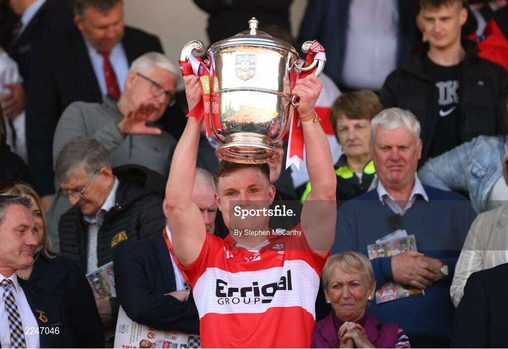 29 May 2022; Ethan Doherty of Derry lifts the Anglo Celt Cup after the Ulster GAA Football Senior Championship Final between Derry and Donegal at St Tiernach's Park in Clones, Monaghan. Photo by Stephen McCarthy/Sportsfile