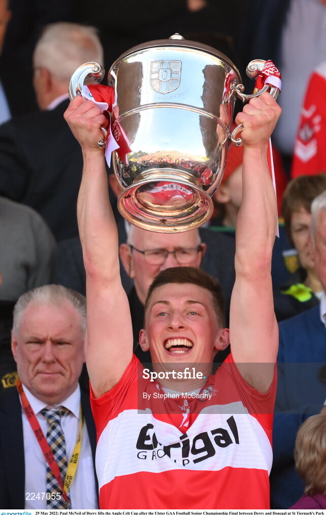 29 May 2022; Paul McNeil of Derry lifts the Anglo Celt Cup after the Ulster GAA Football Senior Championship Final between Derry and Donegal at St Tiernach's Park in Clones, Monaghan. Photo by Stephen McCarthy/Sportsfile