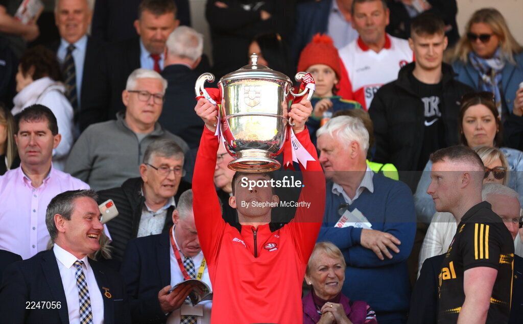 29 May 2022; Calum Downey of Derry lifts the Anglo Celt Cup after the Ulster GAA Football Senior Championship Final between Derry and Donegal at St Tiernach's Park in Clones, Monaghan. Photo by Stephen McCarthy/Sportsfile