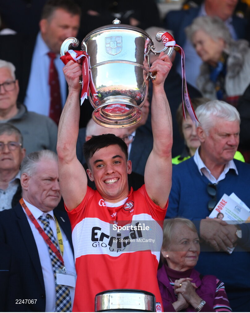 29 May 2022; Conor McCluskey of Derry lifts the Anglo Celt Cup after the Ulster GAA Football Senior Championship Final between Derry and Donegal at St Tiernach's Park in Clones, Monaghan. Photo by Stephen McCarthy/Sportsfile