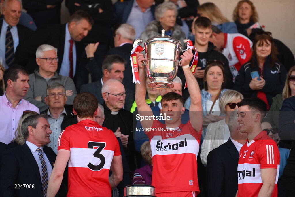 29 May 2022; Oisin McWilliams of Derry lifts the Anglo Celt Cup after the Ulster GAA Football Senior Championship Final between Derry and Donegal at St Tiernach's Park in Clones, Monaghan. Photo by Stephen McCarthy/Sportsfile