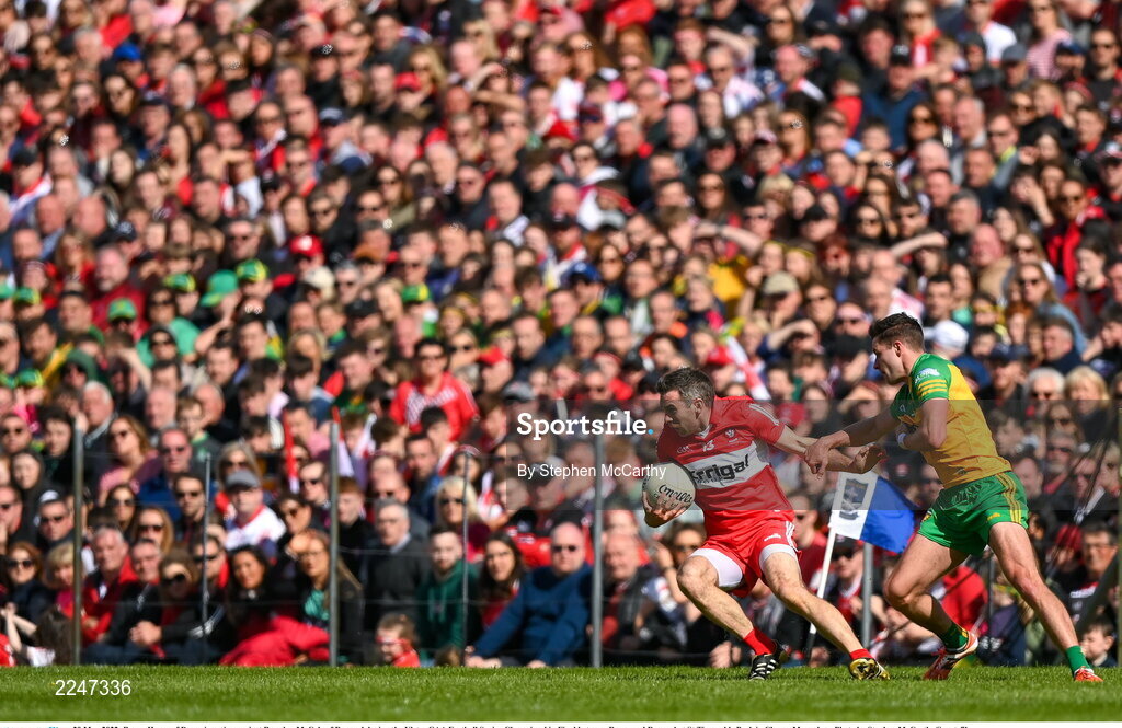 29 May 2022; Benny Heron of Derry in action against Brendan McCole of Donegal during the Ulster GAA Football Senior Championship Final between Derry and Donegal at St Tiernach's Park in Clones, Monaghan. Photo by Stephen McCarthy/Sportsfile