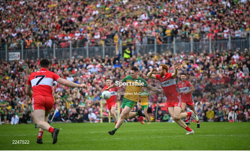 29 May 2022; Jamie Brennan of Donegal in action against Conor Glass of Derry during the Ulster GAA Football Senior Championship Final between Derry and Donegal at St Tiernach's Park in Clones, Monaghan. Photo by Stephen McCarthy/Sportsfile