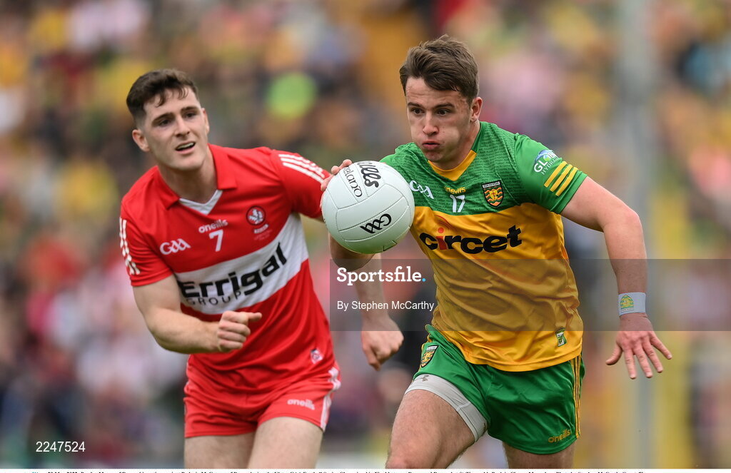 29 May 2022; Peadar Mogan of Donegal in action against Padraig McGrogan of Derry during the Ulster GAA Football Senior Championship Final between Derry and Donegal at St Tiernach's Park in Clones, Monaghan. Photo by Stephen McCarthy/Sportsfile