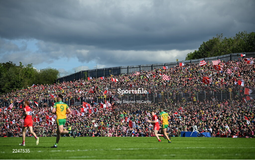 29 May 2022; Derry supporters celebrate a score during the Ulster GAA Football Senior Championship Final between Derry and Donegal at St Tiernach's Park in Clones, Monaghan. Photo by Stephen McCarthy/Sportsfile