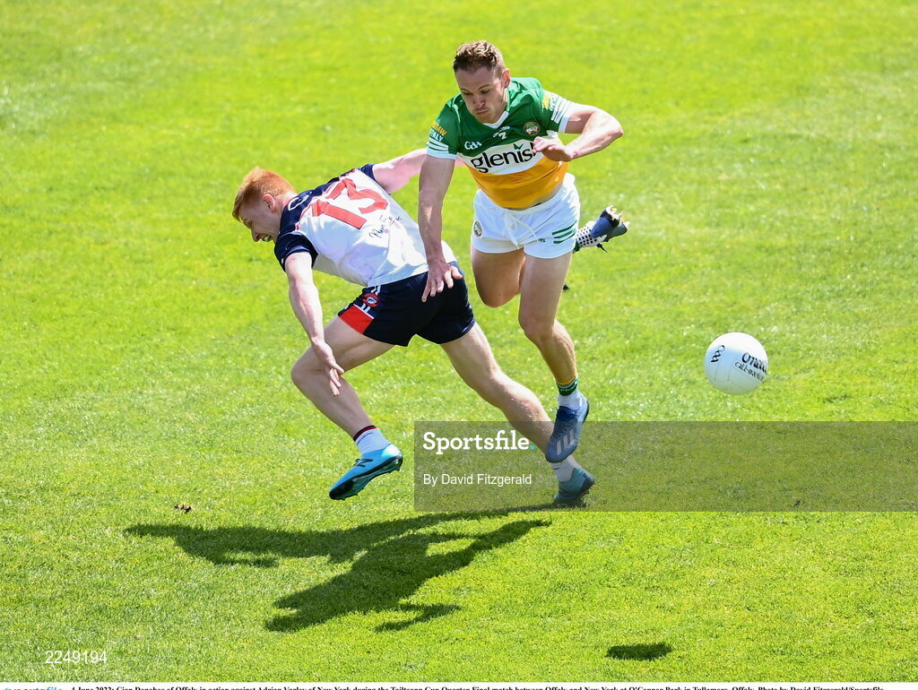 4 June 2022; Cian Donohoe of Offaly in action against Adrian Varley of New York during the Tailteann Cup Quarter-Final match between Offaly and New York at O'Connor Park in Tullamore, Offaly. Photo by David Fitzgerald/Sportsfile