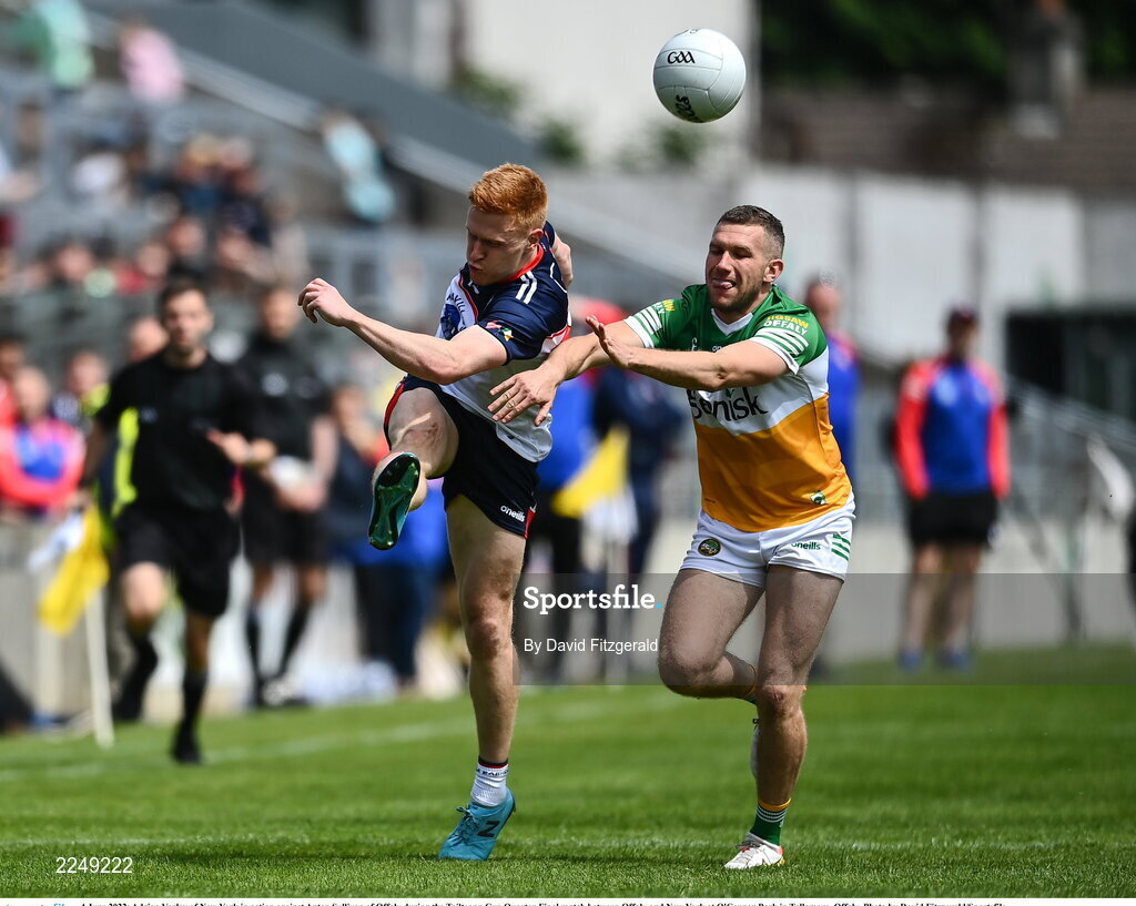 4 June 2022; Adrian Varley of New York in action against Anton Sullivan of Offaly during the Tailteann Cup Quarter-Final match between Offaly and New York at O'Connor Park in Tullamore, Offaly. Photo by David Fitzgerald/Sportsfile