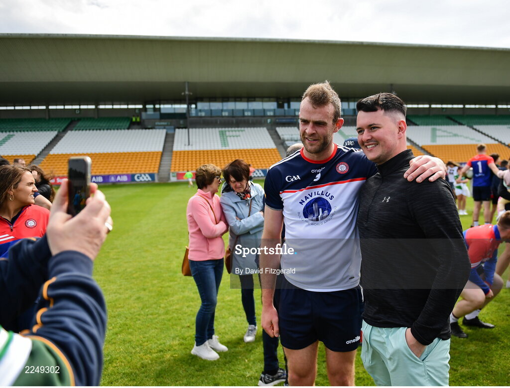 4 June 2022; Jonathan Glynn of New York poses for a photo with a supporter after the Tailteann Cup Quarter-Final match between Offaly and New York at O'Connor Park in Tullamore, Offaly. Photo by David Fitzgerald/Sportsfile