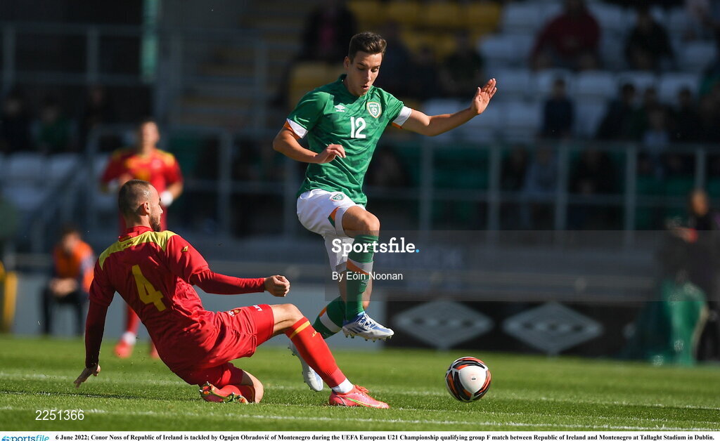 6 June 2022; Conor Noss of Republic of Ireland is tackled by Ognjen Obradovic of Montenegro during the UEFA European U21 Championship qualifying group F match between Republic of Ireland and Montenegro at Tallaght Stadium in Dublin. Photo by Eóin Noonan/Sportsfile