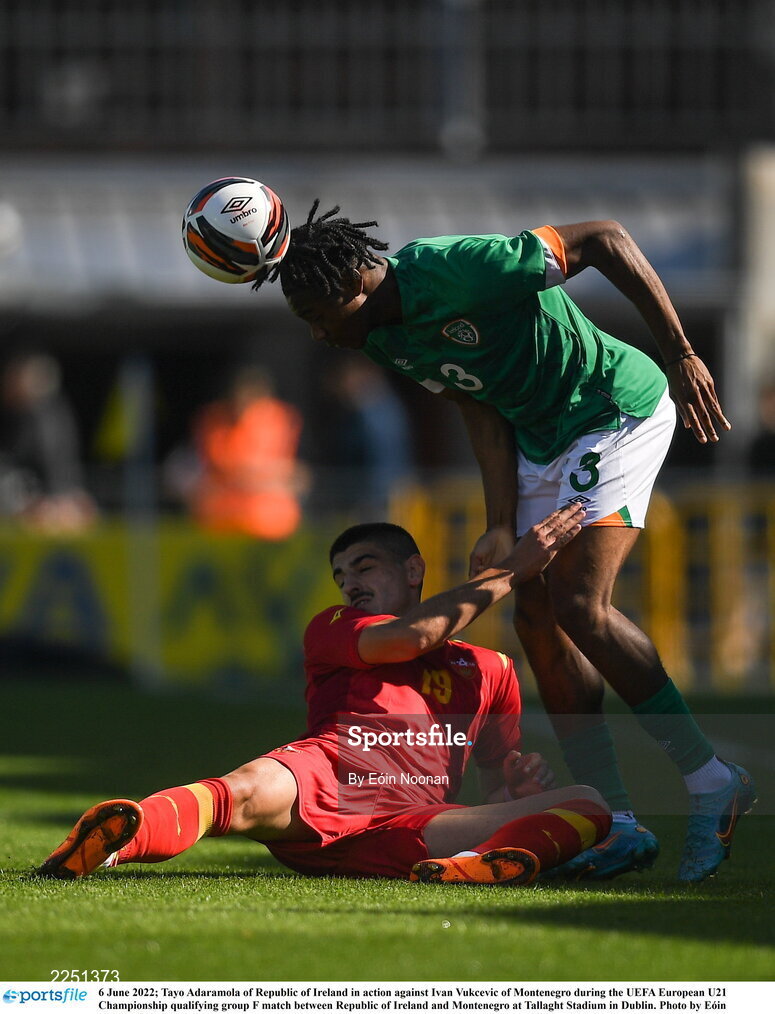 6 June 2022; Tayo Adaramola of Republic of Ireland in action against Ivan Vukcevic of Montenegro during the UEFA European U21 Championship qualifying group F match between Republic of Ireland and Montenegro at Tallaght Stadium in Dublin. Photo by Eóin Noonan/Sportsfile