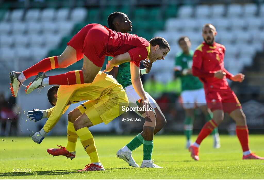 6 June 2022; Anto Babic of Montenegro collides with his own goalkeeper Nikola Ivezic during the UEFA European U21 Championship qualifying group F match between Republic of Ireland and Montenegro at Tallaght Stadium in Dublin. Photo by Seb Daly/Sportsfile