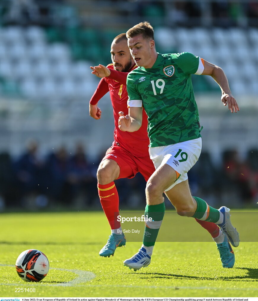 6 June 2022; Evan Ferguson of Republic of Ireland in action against Ognjen Obradovic of Montenegro during the UEFA European U21 Championship qualifying group F match between Republic of Ireland and Montenegro at Tallaght Stadium in Dublin. Photo by Seb Daly/Sportsfile