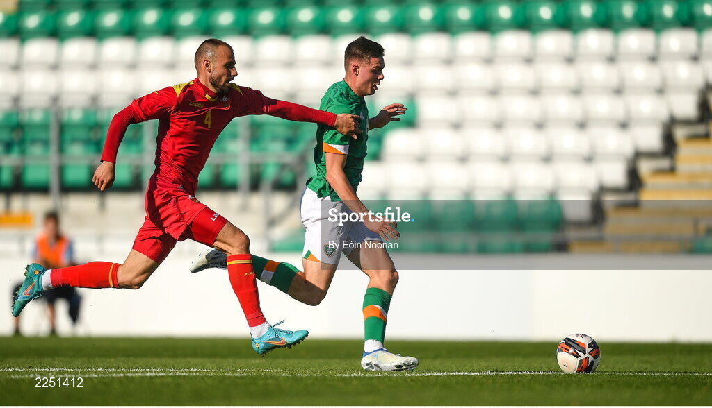 6 June 2022; Evan Ferguson of Republic of Ireland in action against Ognjen Obradovic of Montenegro during the UEFA European U21 Championship qualifying group F match between Republic of Ireland and Montenegro at Tallaght Stadium in Dublin. Photo by Eóin Noonan/Sportsfile