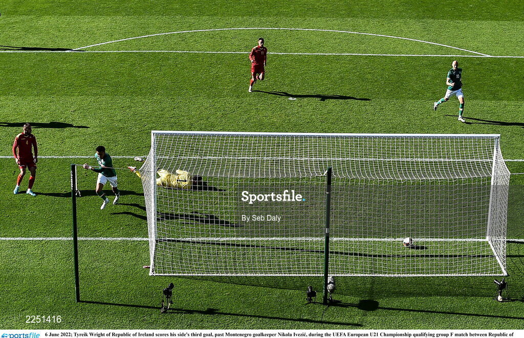 6 June 2022; Tyreik Wright of Republic of Ireland scores his side's third goal, past Montenegro goalkeeper Nikola Ivezic, during the UEFA European U21 Championship qualifying group F match between Republic of Ireland and Montenegro at Tallaght Stadium in Dublin. Photo by Seb Daly/Sportsfile