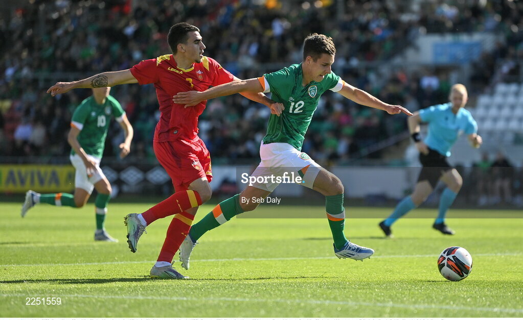 6 June 2022; Conor Noss of Republic of Ireland in action against Nikola Janjic of Montenegro during the UEFA European U21 Championship qualifying group F match between Republic of Ireland and Montenegro at Tallaght Stadium in Dublin. Photo by Seb Daly/Sportsfile