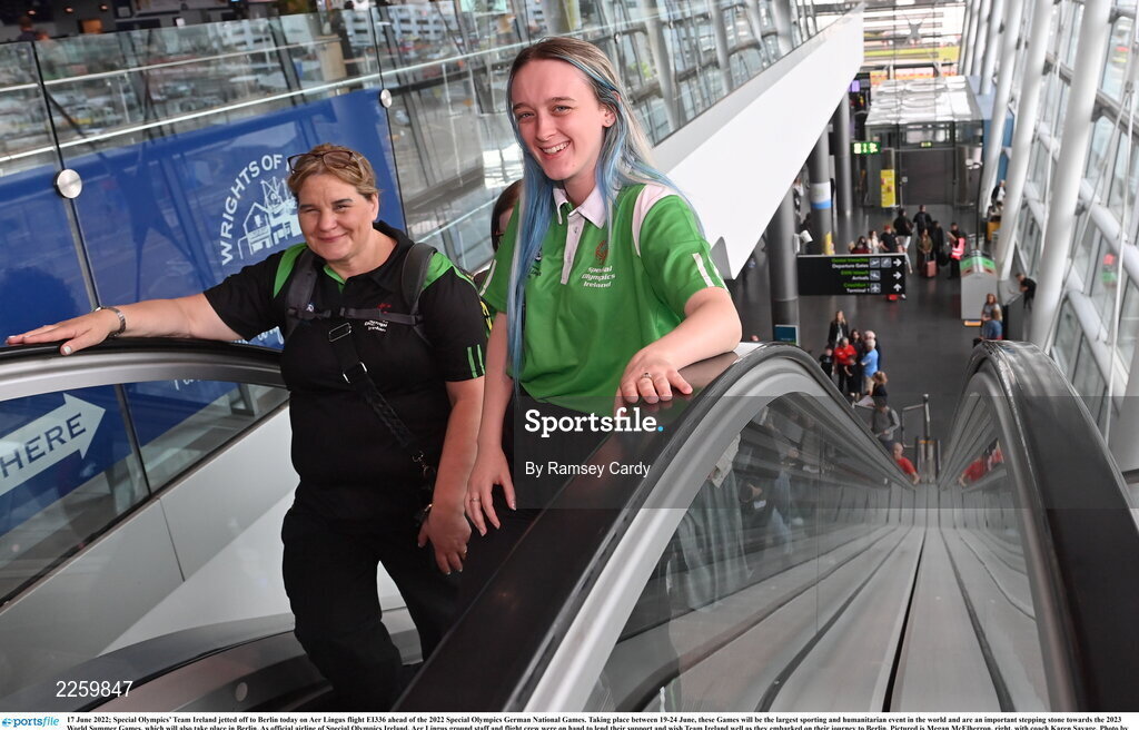 17 June 2022; Special Olympics’ Team Ireland jetted off to Berlin today on Aer Lingus flight EI336 ahead of the 2022 Special Olympics German National Games. Taking place between 19-24 June, these Games will be the largest sporting and humanitarian event in the world and are an important stepping stone towards the 2023 World Summer Games, which will also take place in Berlin. As official airline of Special Olympics Ireland, Aer Lingus ground staff and flight crew were on hand to lend their support and wish Team Ireland well as they embarked on their journey to Berlin. Pictured is Megan McElherron, right, with coach Karen Savage. Photo by Ramsey Cardy/Sportsfile