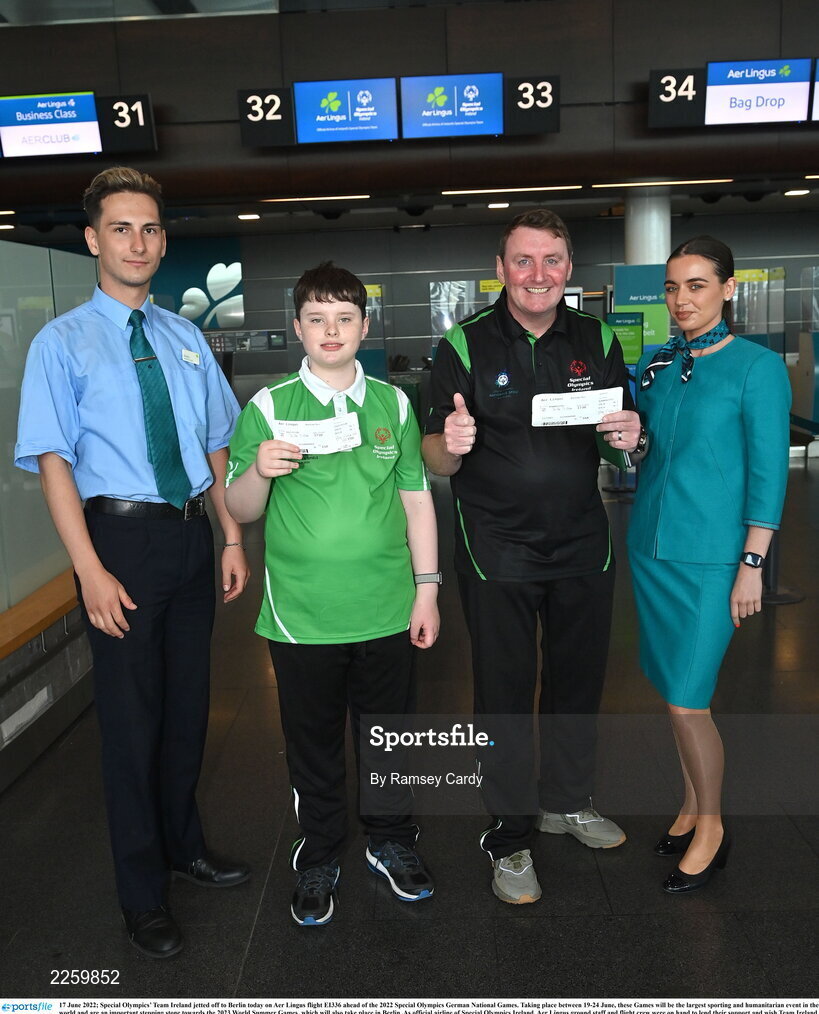 17 June 2022; Special Olympics’ Team Ireland jetted off to Berlin today on Aer Lingus flight EI336 ahead of the 2022 Special Olympics German National Games. Taking place between 19-24 June, these Games will be the largest sporting and humanitarian event in the world and are an important stepping stone towards the 2023 World Summer Games, which will also take place in Berlin. As official airline of Special Olympics Ireland, Aer Lingus ground staff and flight crew were on hand to lend their support and wish Team Ireland well as they embarked on their journey to Berlin. Pictured is Declan Foley, left, and coach Cyril McNamara, with Aer Lingus staff Denis Volkovs and Ciara Poole. Photo by Ramsey Cardy/Sportsfile