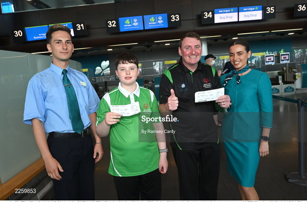 17 June 2022; Special Olympics’ Team Ireland jetted off to Berlin today on Aer Lingus flight EI336 ahead of the 2022 Special Olympics German National Games. Taking place between 19-24 June, these Games will be the largest sporting and humanitarian event in the world and are an important stepping stone towards the 2023 World Summer Games, which will also take place in Berlin. As official airline of Special Olympics Ireland, Aer Lingus ground staff and flight crew were on hand to lend their support and wish Team Ireland well as they embarked on their journey to Berlin. Pictured is Declan Foley, left, and coach Cyril McNamara, with Aer Lingus staff Denis Volkovs and Ciara Poole. Photo by Ramsey Cardy/Sportsfile