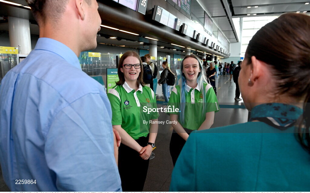 17 June 2022; Special Olympics’ Team Ireland jetted off to Berlin today on Aer Lingus flight EI336 ahead of the 2022 Special Olympics German National Games. Taking place between 19-24 June, these Games will be the largest sporting and humanitarian event in the world and are an important stepping stone towards the 2023 World Summer Games, which will also take place in Berlin. As official airline of Special Olympics Ireland, Aer Lingus ground staff and flight crew were on hand to lend their support and wish Team Ireland well as they embarked on their journey to Berlin. Pictured is Rebecca Devlin, left, and Megan McElherron, in conversation with Aer Lingus staff Ciara Poole and Denis Volkovs. Photo by Ramsey Cardy/Sportsfile