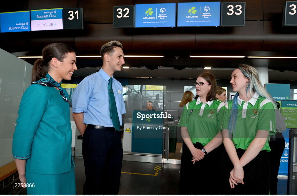 17 June 2022; Special Olympics’ Team Ireland jetted off to Berlin today on Aer Lingus flight EI336 ahead of the 2022 Special Olympics German National Games. Taking place between 19-24 June, these Games will be the largest sporting and humanitarian event in the world and are an important stepping stone towards the 2023 World Summer Games, which will also take place in Berlin. As official airline of Special Olympics Ireland, Aer Lingus ground staff and flight crew were on hand to lend their support and wish Team Ireland well as they embarked on their journey to Berlin. Pictured is Rebecca Devlin, left, and Megan McElherron, in conversation with Aer Lingus staff Ciara Poole and Denis Volkovs. Photo by Ramsey Cardy/Sportsfile