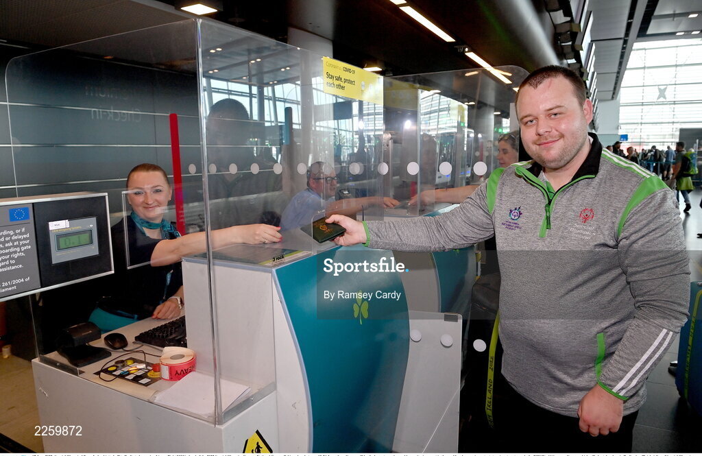 17 June 2022; Special Olympics’ Team Ireland jetted off to Berlin today on Aer Lingus flight EI336 ahead of the 2022 Special Olympics German National Games. Taking place between 19-24 June, these Games will be the largest sporting and humanitarian event in the world and are an important stepping stone towards the 2023 World Summer Games, which will also take place in Berlin. As official airline of Special Olympics Ireland, Aer Lingus ground staff and flight crew were on hand to lend their support and wish Team Ireland well as they embarked on their journey to Berlin. Pictured is Simon Lowry, badminton, with Monika Korpacz. Photo by Ramsey Cardy/Sportsfile
