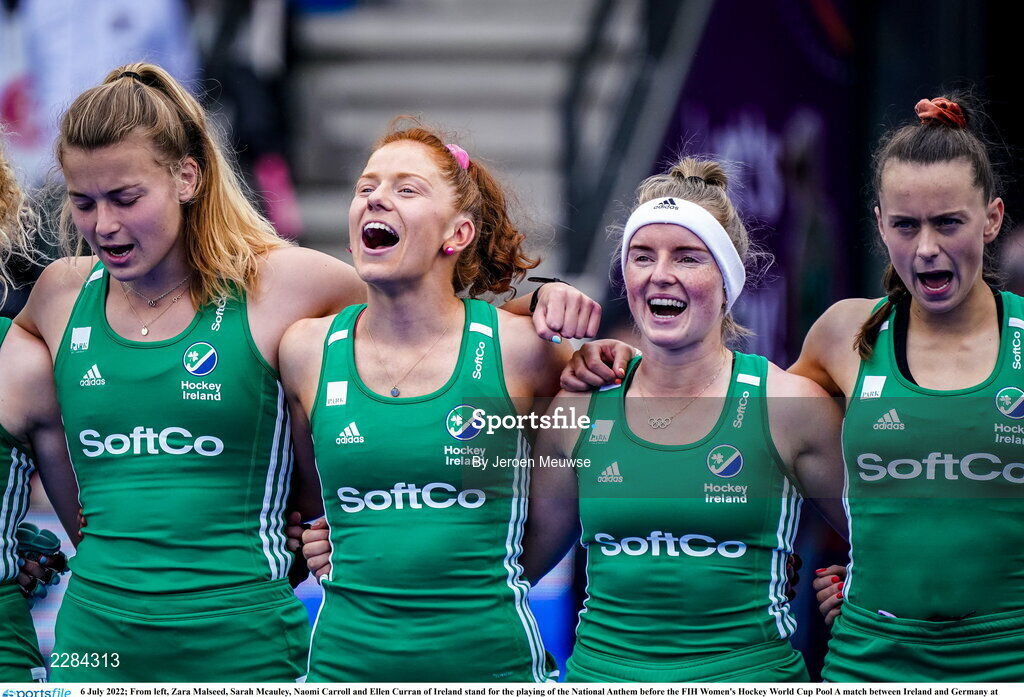6 July 2022; From left, Zara Malseed, Sarah Mcauley, Naomi Carroll and Ellen Curran of Ireland stand for the playing of the National Anthem before the FIH Women's Hockey World Cup Pool A match between Ireland and Germany at Wagener Stadium in Amstelveen, Netherlands. Photo by Jeroen Meuwse/Sportsfile