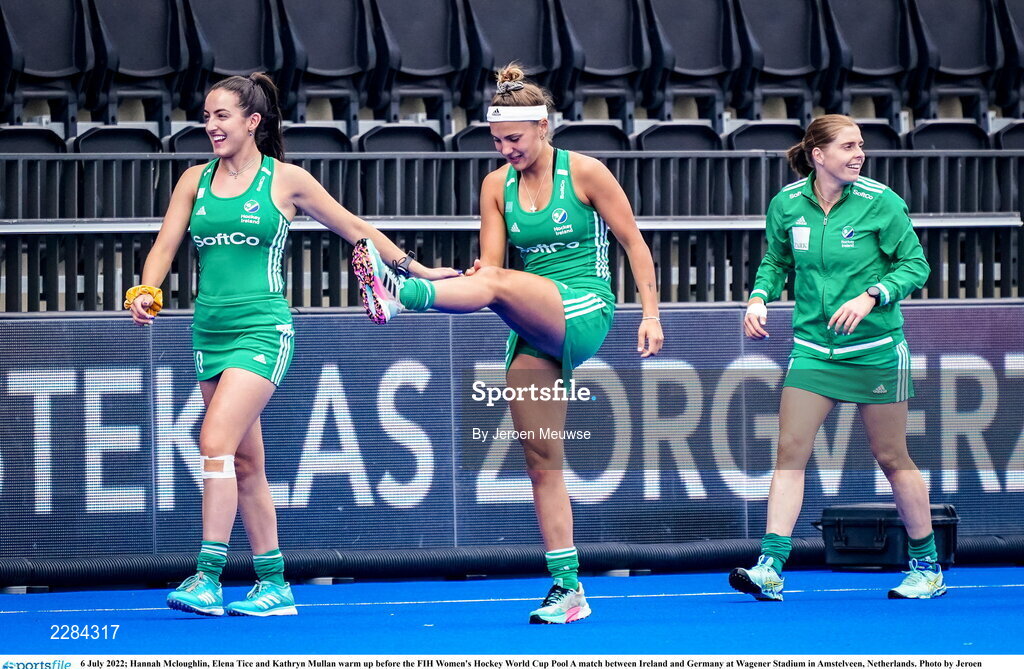 6 July 2022; Hannah Mcloughlin, Elena Tice and Kathryn Mullan  of Ireland warm up before the FIH Women's Hockey World Cup Pool A match between Ireland and Germany at Wagener Stadium in Amstelveen, Netherlands. Photo by Jeroen Meuwse/Sportsfile