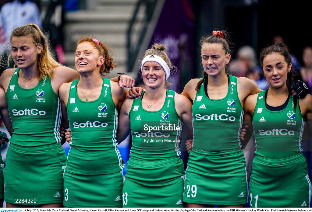 6 July 2022; From left, Zara Malseed, Sarah Mcauley, Naomi Carroll, Ellen Curran and Anna O’Flanagan of Ireland stand for the playing of the National Anthem before the FIH Women's Hockey World Cup Pool A match between Ireland and Germany at Wagener Stadium in Amstelveen, Netherlands. Photo by Jeroen Meuwse/Sportsfile