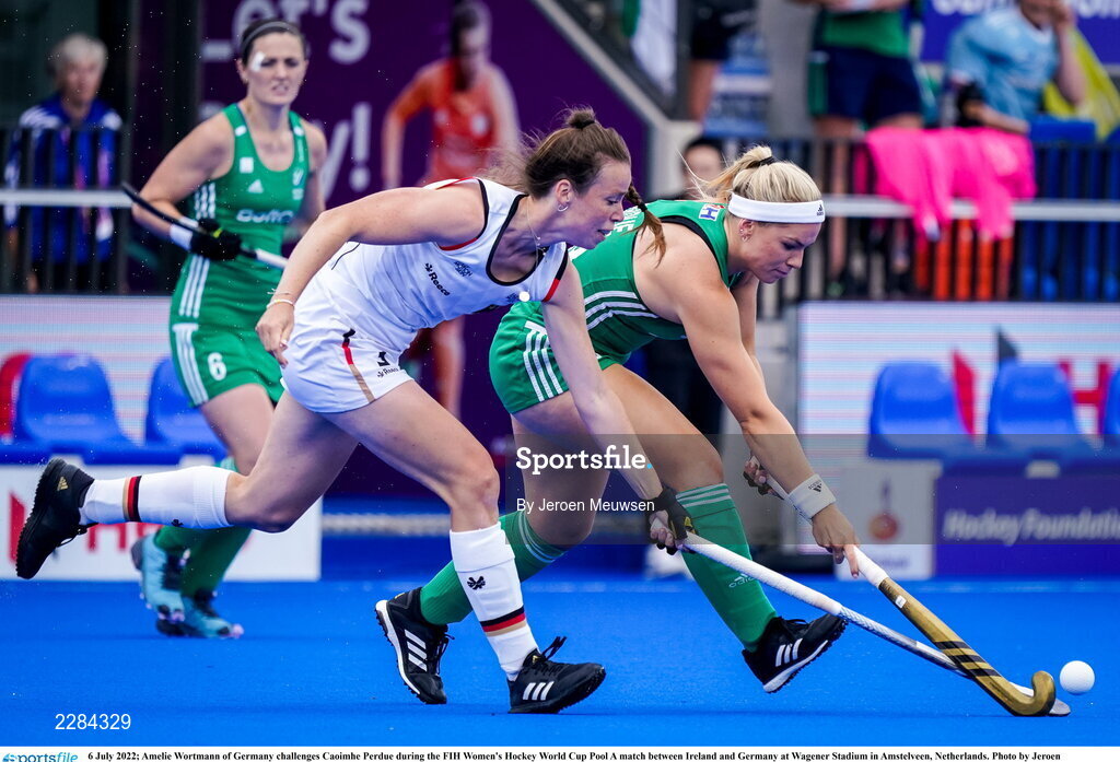 6 July 2022; Caoimhe Perdue of Ireland in action against Amelie Wortmann of Germany during the FIH Women's Hockey World Cup Pool A match between Ireland and Germany at Wagener Stadium in Amstelveen, Netherlands. Photo by Jeroen Meuwsen/Sportsfile
