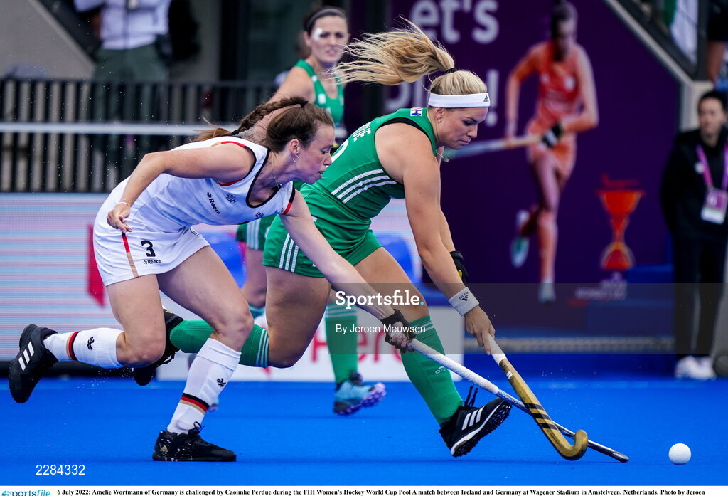 6 July 2022; Caoimhe Perdue of Ireland in action against Amelie Wortmann of Germany during the FIH Women's Hockey World Cup Pool A match between Ireland and Germany at Wagener Stadium in Amstelveen, Netherlands. Photo by Jeroen Meuwsen/Sportsfile
