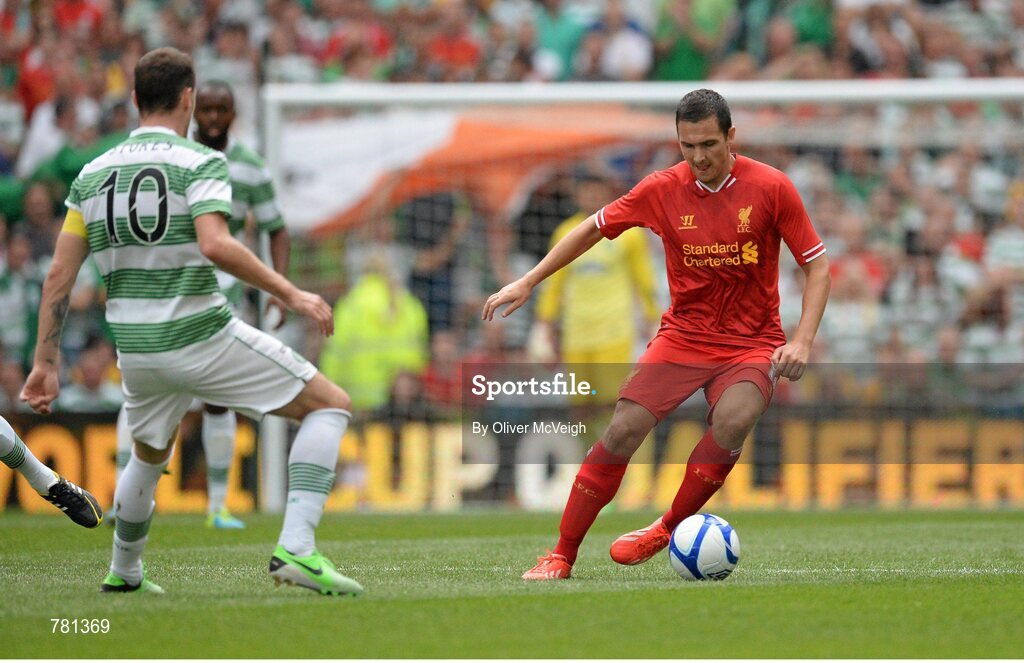 10 August 2013; Stewart Downing, Liverpool XI, in action against Anthony Stokes, Glasgow Celtic XI. Dublin Decider, Liverpool XI v Glasgow Celtic XI, Aviva Stadium, Lansdowne Road, Dublin. Picture credit: Oliver McVeigh / SPORTSFILE