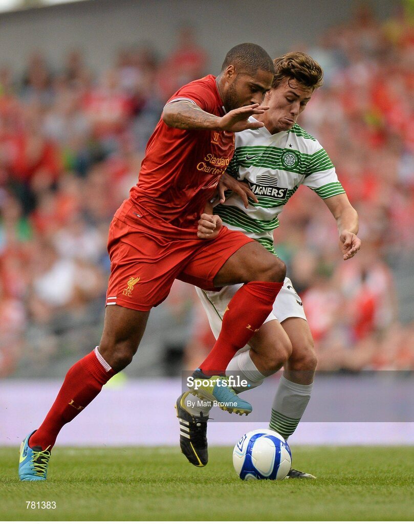 10 August 2013; Glen Johnson, Liverpool XI, in action against Jackson Irvine, Glasgow Celtic XI. Dublin Decider, Liverpool XI v Glasgow Celtic XI, Aviva Stadium, Lansdowne Road, Dublin. Picture credit: Matt Browne / SPORTSFILE