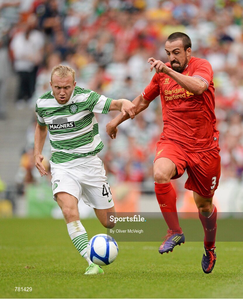 10 August 2013; Jose Enrique, Liverpool XI, in action against Dylan McGeouch, Glasgow Celtic XI. Dublin Decider, Liverpool XI v Glasgow Celtic XI, Aviva Stadium, Lansdowne Road, Dublin. Picture credit: Oliver McVeigh / SPORTSFILE
