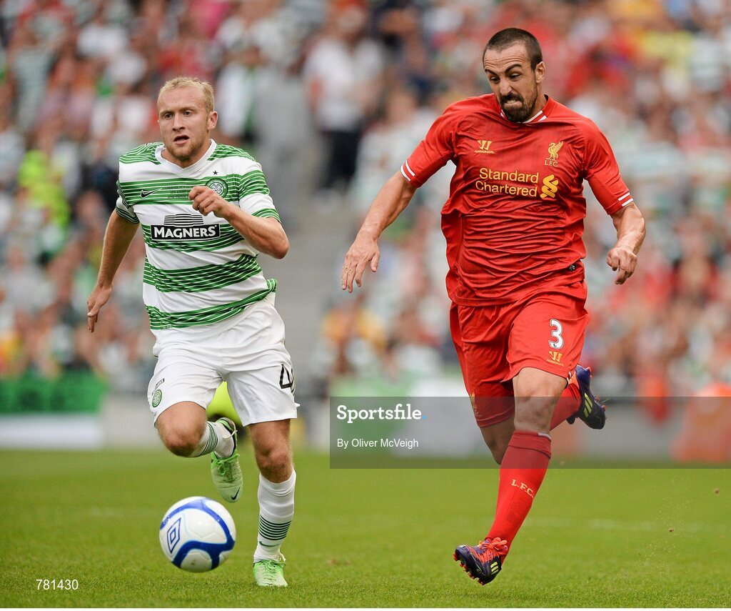 10 August 2013; Dylan McGeouch, Glasgow Celtic XI, in action against Jose Enrique, Liverpool XI. Dublin Decider, Liverpool XI v Glasgow Celtic XI, Aviva Stadium, Lansdowne Road, Dublin. Picture credit: Oliver McVeigh / SPORTSFILE