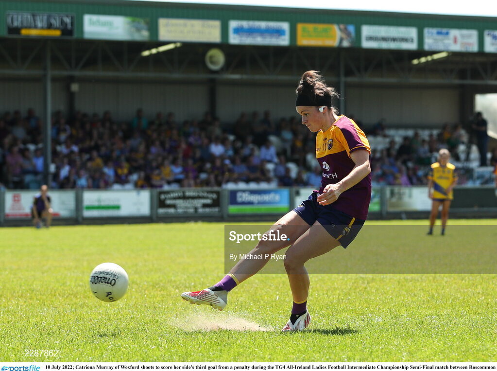 10 July 2022; Catriona Murray of Wexford shoots to score her side's third goal from a penalty during the TG4 All-Ireland Ladies Football Intermediate Championship Semi-Final match between Roscommon and Wexford at Crettyard GAA club, Crettyard, Laois. Photo by Michael P Ryan/Sportsfile