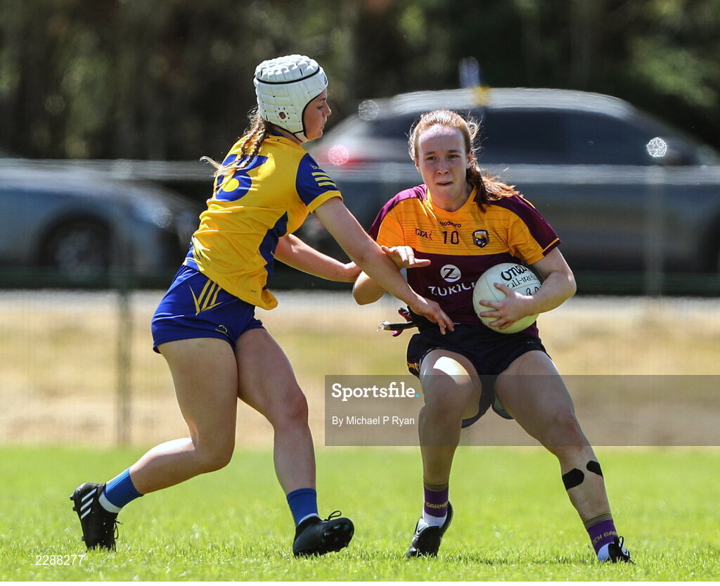 10 July 2022; Sherene Hamiliton of Wexford in action against Aisling Hanly of Roscommon during the TG4 All-Ireland Ladies Football Intermediate Championship Semi-Final match between Roscommon and Wexford at Crettyard GAA club, Crettyard, Laois. Photo by Michael P Ryan/Sportsfile