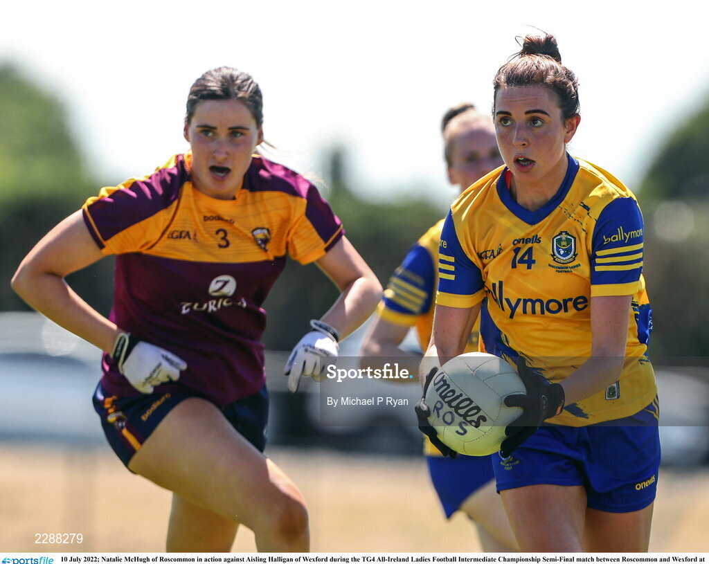 10 July 2022; Natalie McHugh of Roscommon in action against Aisling Halligan of Wexford during the TG4 All-Ireland Ladies Football Intermediate Championship Semi-Final match between Roscommon and Wexford at Crettyard GAA club, Crettyard, Laois. Photo by Michael P Ryan/Sportsfile