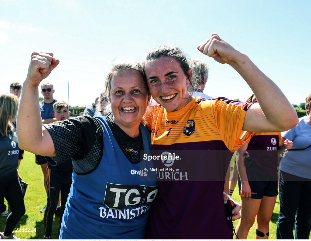 10 July 2022; Wexford manager Lizzy Kent, left, celebrates with Ciara Banville after the TG4 All-Ireland Ladies Football Intermediate Championship Semi-Final match between Roscommon and Wexford at Crettyard GAA club, Crettyard, Laois. Photo by Michael P Ryan/Sportsfile